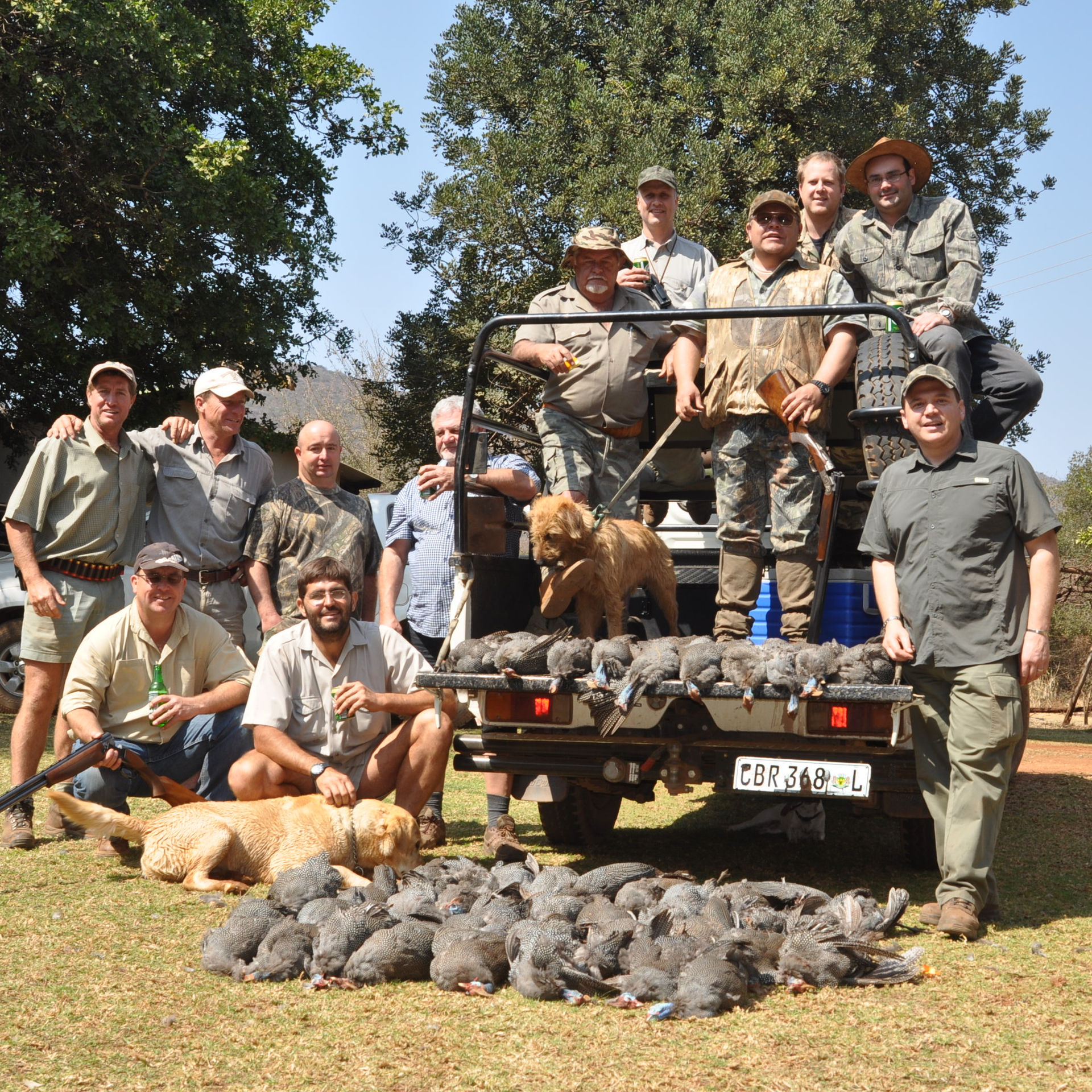 Wing-shooting party with the day's birds